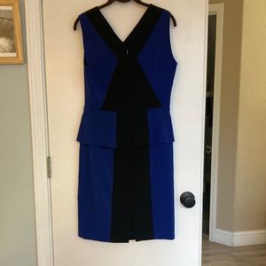 BCBG Max Azria blue and black peplum dress.